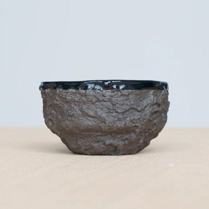 Stone Age black tea cup